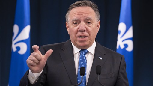 Ottawa doit relocaliser de force les demandeurs d'asile, estime Legault